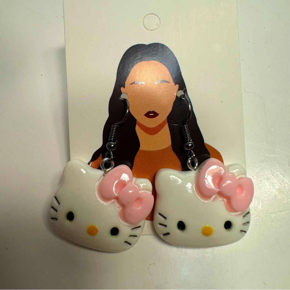 3D HELLO KITTY WHITE PLASTIC WITH PINK  BOW EARRINGS